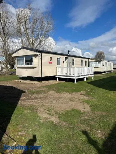 6 Beds 2 Sofa bed Family friendly - unlimited Wi-Fi, Warm, Cozy Sun decking Caravan at Seawick Holiday Park - Image 1