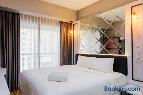 3BR Apartment with Pool View at M-Town Signature By Travelio - Image 1