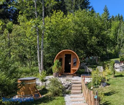 Ferienhaus Lechner am Waldrand mit Holzfasssauna & Außendusche, Bergblick und Naturgarten" - Image 1