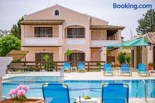 Nikos Pool House & Apartments - Image 1