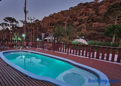 Chalés e Suítes Jardim do Buda com piscina aquecida - Image 1