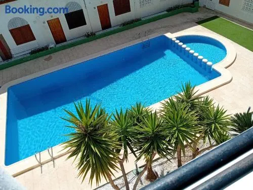 Studio with pool and sunrise view at 10 min beach walk - Image 1