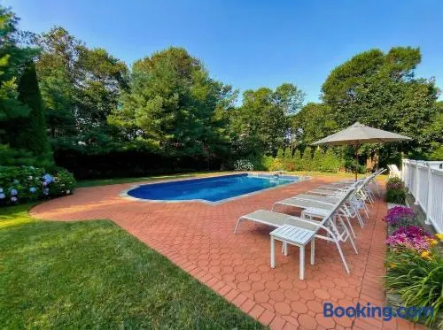 Hamptons 4BR Oasis with Heated Pool, Hot Tub and Beach - Image 1