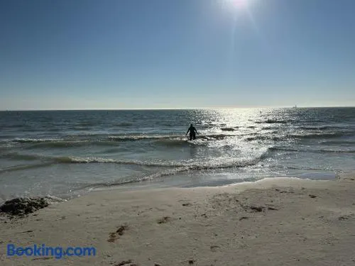 2BR and 1BR private RVs in resort with pool - Close to gulf beaches - Full kitchen, indoor-outdoor living spaces, BBQ, Pizza Oven - Near Sanibel Island, Fort Myers Beach - Resort has recreation amenities and laundry - High-speed WiFi fiber Internet - Image 1