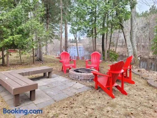 Whispering Pines Riverside Retreat - Image 1