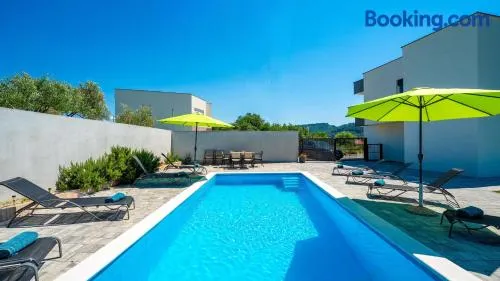Villa Rab Paradise pool by Villas Guide - Image 1