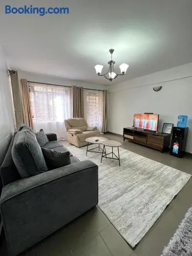 comfortplace 2 bedrooms in town behind National bank - Image 1