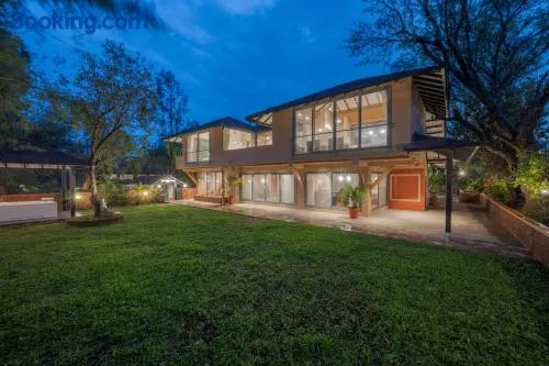 SaffronStays Red Brick House - 3BR English-style villa with verandah dining, orchard lawn & classic charm - Image 1