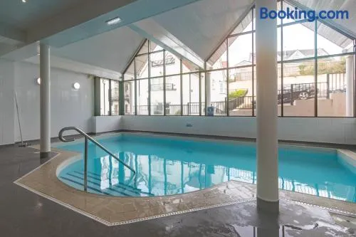 Tenby Sea View Apartment with Swimming Pool - Image 1