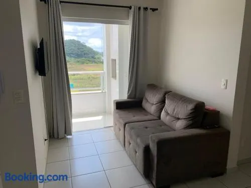 Apartamento com 1 Suite e 1 Quarto - Image 1