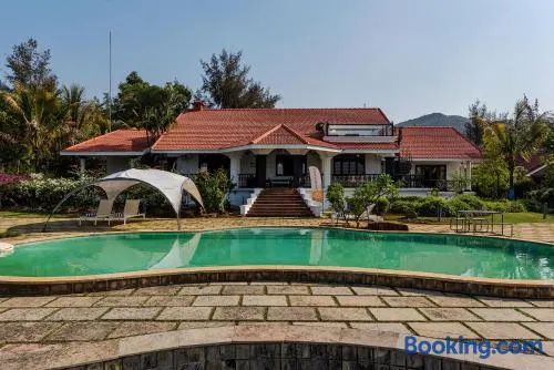 SaffronStays Moira 6-BR Lakeside Villa with Infinity Pool & Jacuzzi - Image 1
