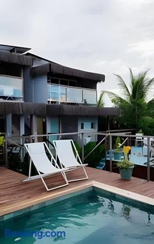 Flat Térreo com Piscina e Jardim Tropical - Image 1