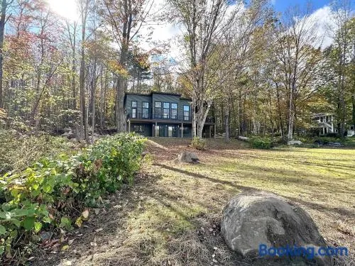 Luxe Modern Lakefront Oasis - Hot Tub, Sunset Views, Pet & Family Friendly! Close to UMF! - Image 1