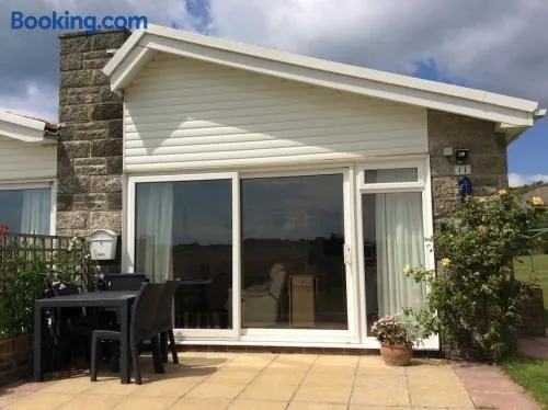 Cliff End Self catering bungalow with sea views in beautiful rural West Wight Free WiFi and ferry offers available Short walk to beach - Image 1