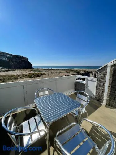Whispering Waves in Porthtowan, Beachfront Apartment - Image 1