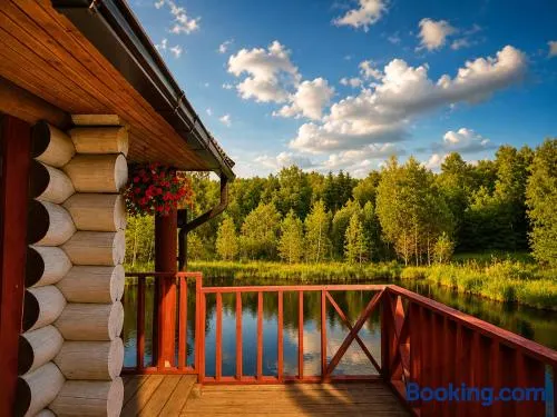 Peaceful Nature Cottage near Talsi with Hot Tub, Sauna & Pond, Camping Ives - Image 1