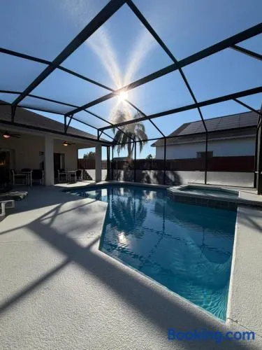 Bright & Spacious Disney Home - Private Pool, Heated Spa & Game Room - Sleeps 14 - Image 1