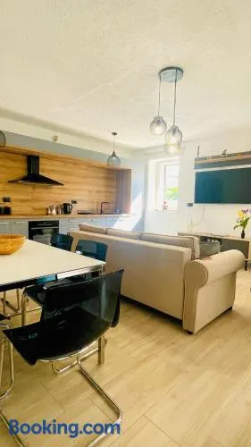Modern Apartment with Fireplace & Stylish Kitchen - Image 1