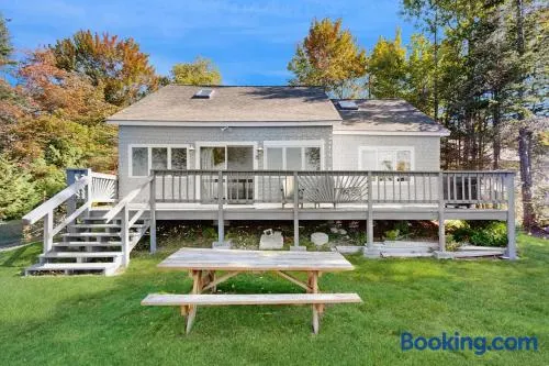 Lakefront home with private dock, mooring, pebble beach, grill, & firepit - Image 1