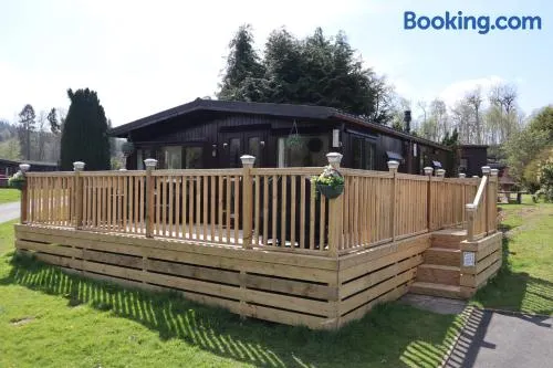 HEDDFAN, Luxury 3 bedroom timber lodge, Now with WiFi, Caer Beris Holiday Park, Builth Wells, SORRY NO TRADESMEN OR CONTRACTORS ALLOWED - Image 1