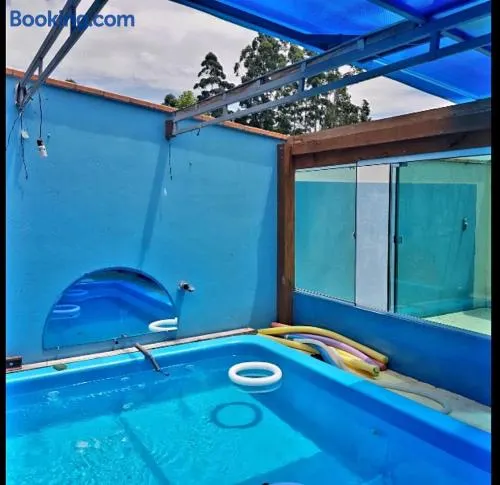 Casa de sítio com piscina coberta, sala de jogos e fogão a lenha - Image 1