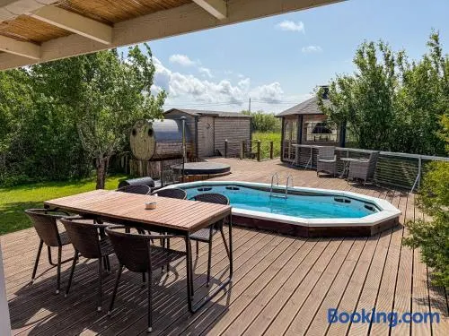 Seaside Retreat with Hot tub,Sauna, Pool & BBQ - Image 1