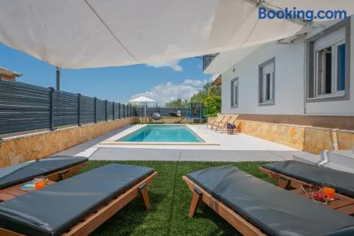 Luxury Villa Kristina with Heated Pool near Omis for 12 Guests - Image 1