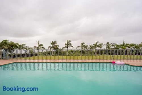 StayVista's Eva Villa - Lakeside Luxury with Modern Decor, Pool & Expansive Lawn - Near Sula - Image 1