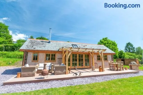 Idyllic countryside cabin with stream and lake - Image 1