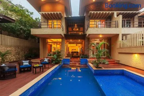 StayVista's The Happy Hive - Cozy rooms and a pool for a delightful stay - Image 1