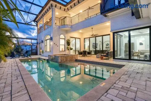 Spacious Luxury Waterfront Retreat with Pool & Spa - Image 1