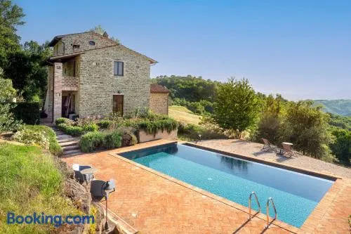 GuestHost - Casale dei Tramonti - Nature's Haven Apartments in Renovated Farmhouse with Pool - Image 1