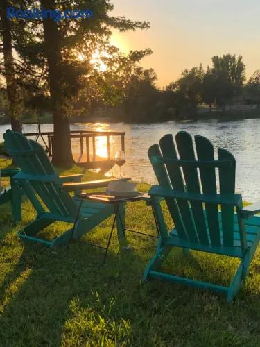Luxury Riverside Estate - 3BR Home or 1BR Cottage or BOTH - Sleeps 14 - Swim, fish, relax, refresh - Image 1