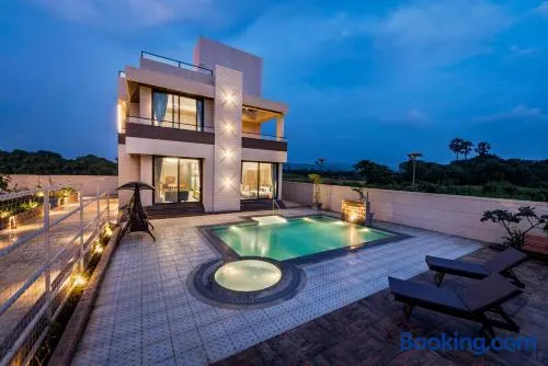 SaffronStays Nishta - 4BR pet-friendly villa with pool, turf, gazebo & terrace BBQ views in Alibaug - Image 1