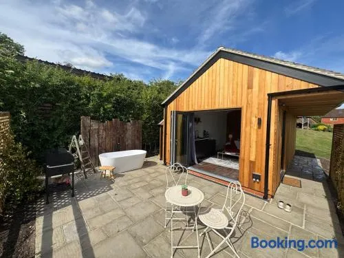 Luxury Spa Cabin with Outdoor Bath, Sauna & Fireplace - Image 1
