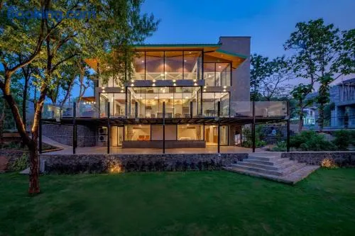 SaffronStays Sonnet - 4BR veg pool villa with grand piano, theater, lawn & mountain views near Mumbai - Image 1