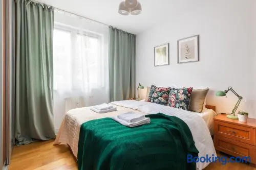 Elektoralna 12A - Colorful Apartment with Balcony by Noclegi Renters - Image 1