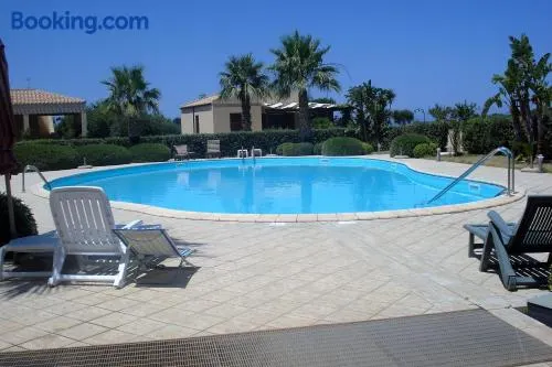 Casa Vacanze Libeccio - Villetta con giardino e piscina condominiale - Image 1