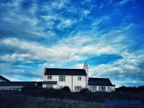 Warren Cottage with stunning views over Burgh Island and The Pilchard Inn - Image 1