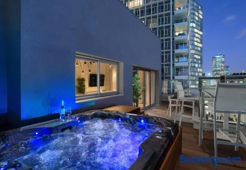 Spacious 3BR Penthouse with Jacuzzi on Rosthchild by HolyGuest - Image 1