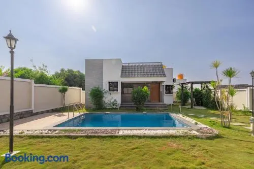 JhilMil Pool Villa by StayJade 2BHK Lawn - Image 1