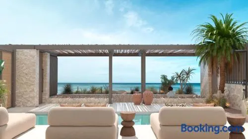 Iris Beachfront Residence, Newly Renewed with Pool and BBQ, By ThinkVilla - Image 1