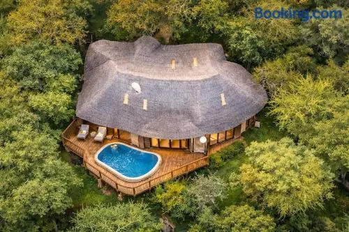 Majestic Villa with Pools & Outdoor Bar in Maanzoni - Image 1