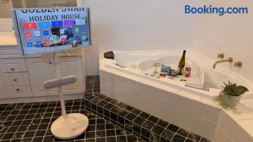 Work and Unwind Retreat King Bed Love Heart Hot Tub for 2 Game Room Cinema on the bed 500Mbps WiFi Ideal for Business Couples and Special Events - Image 1