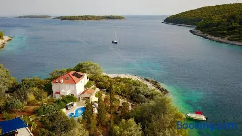 Waterfront villa with pool - Image 1