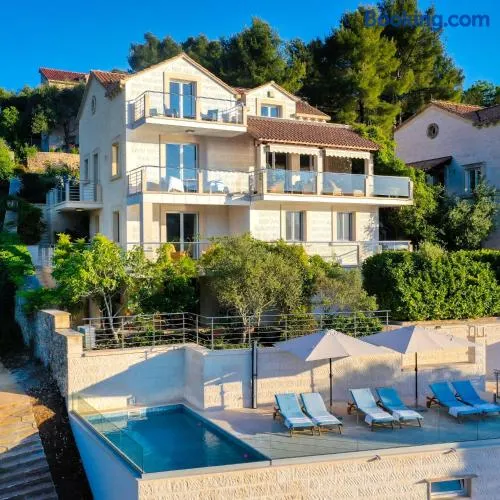 VILLA PHILIPPA - luxurious five-room villa - idyllic location - first row to the sea - spectacular view of the sea bay - unforgettable sunsets - 15 minutes from Supetar ferry port - free parking - private heated pool - Image 1