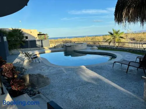 Sunny Poolside Escape Near the Beach - Image 1