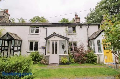 Milldam Cottage a characterful cottage in an elevated location above Coniston with walks from the door - Image 1