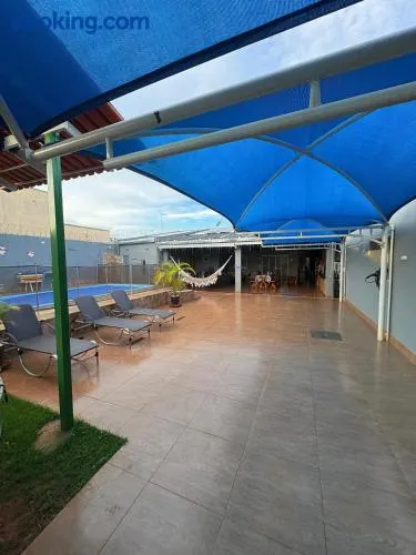 Casa ampla com piscina e lazer completo a 1h do Autódromo de Goiânia - Image 1