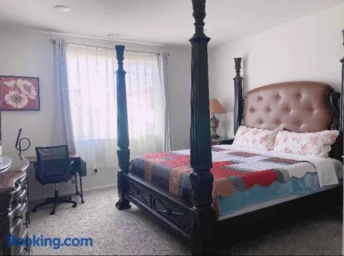 Large master bedroom with Separate bathroom and work desk on the first floor - Image 1